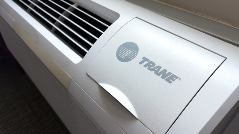 Trane air conditioning unit with logo prominently visible.