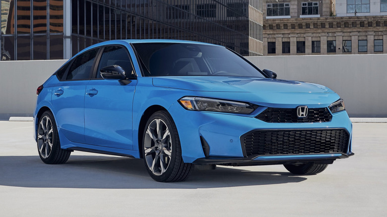 2026 Honda Civic Hatchback Sport Touring Hybrid in the city