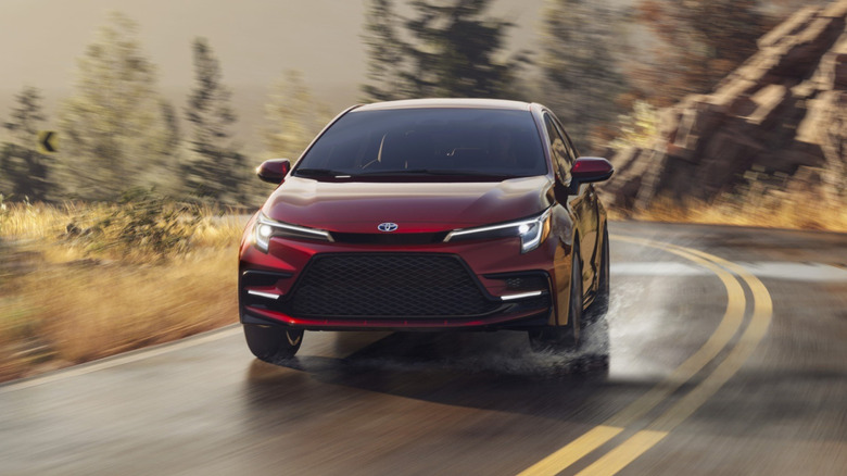 2026 Toyota Corolla Hybrid on a winding rural road