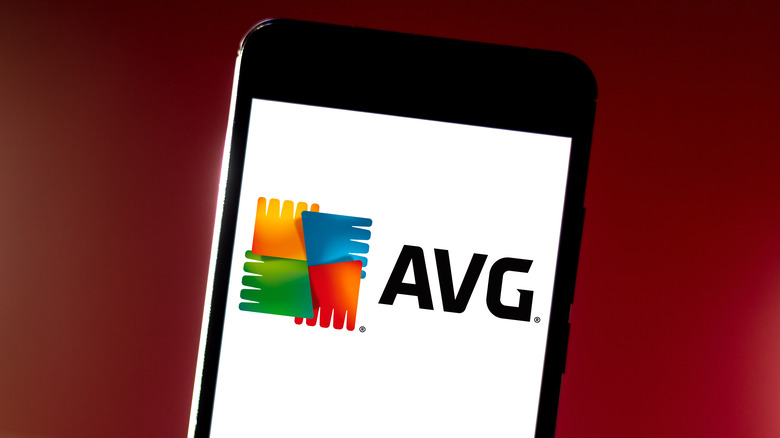 AVG antivirus app logo displayed on a smartphone with a maroon background