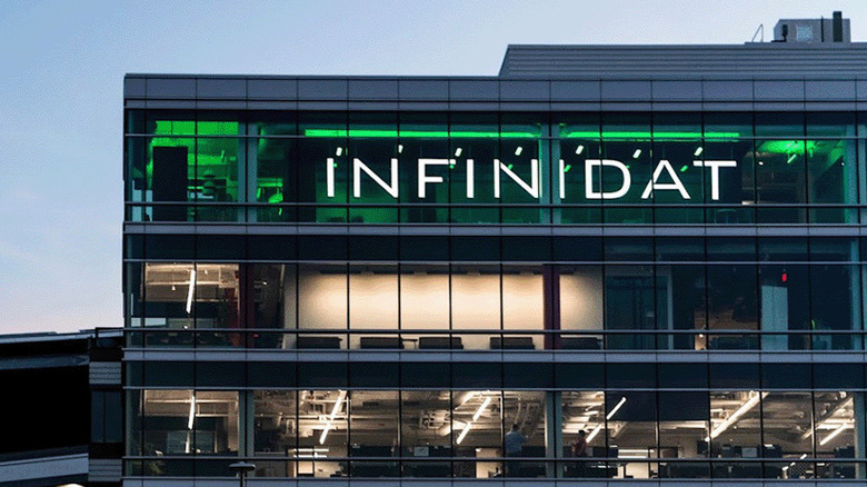 View of Infinidat headquarters with the top floor showing a green hue.