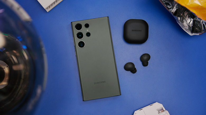 Samsung Galaxy Buds2 Pro and Samsung Galaxy S23 Ultra posed on table