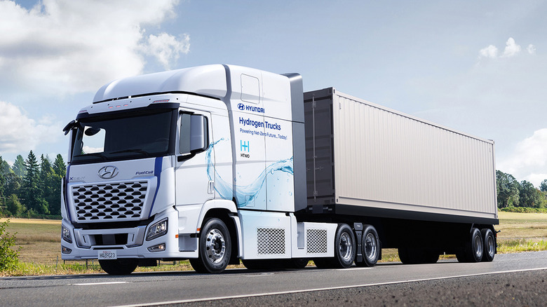 Hyundai XCIENT hydrogen fuel cell semi-truck seen from left front on road