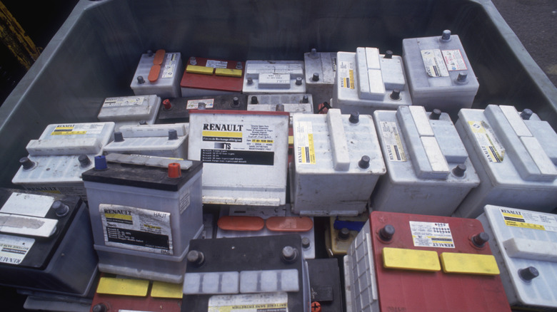 A collection of old car batteries.