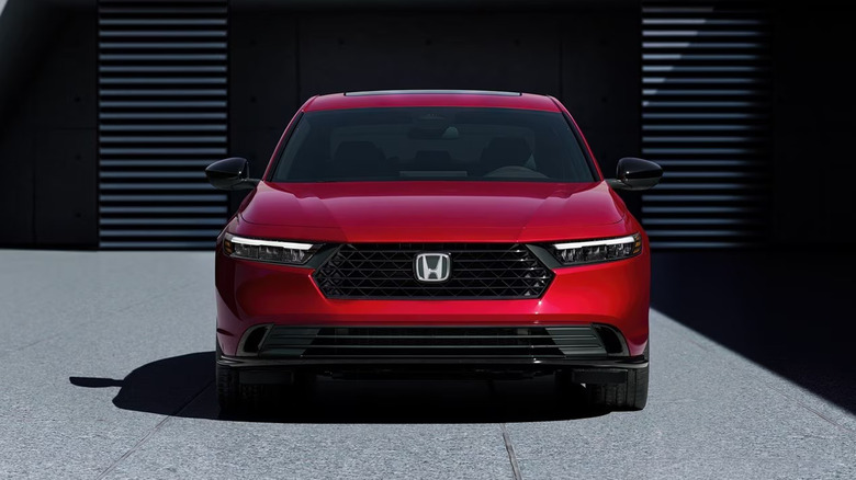 Front view of red Honda Accord parked on a gray surface