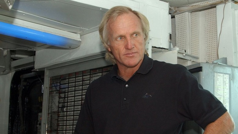 Greg Norman on the USS John F Kennedy aircraft carrier