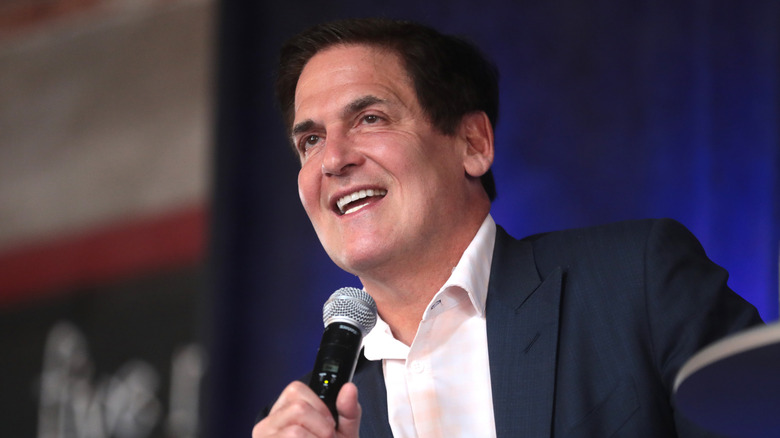 Mark Cuban holding a microphone