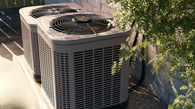 Two HVAC units outside a home
