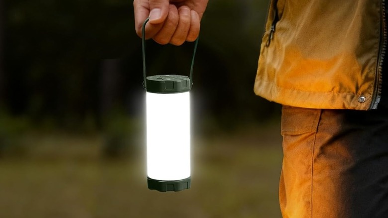 Glocusent LED Camping Light being used handheld