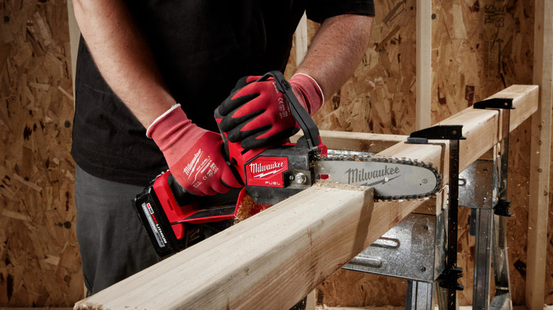 A shot of the Milwaukee M18 Fuel 8 in. 18V Lithium-Ion Brushless Electric Battery Chainsaw