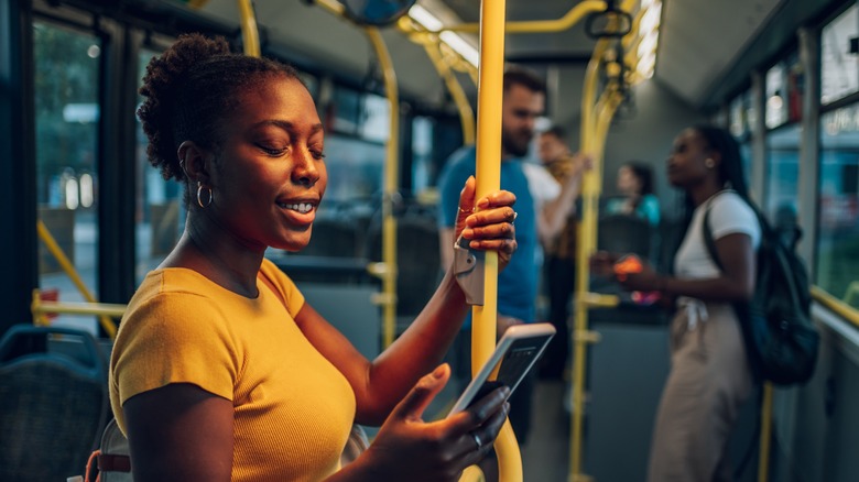 A woman commuting by train.