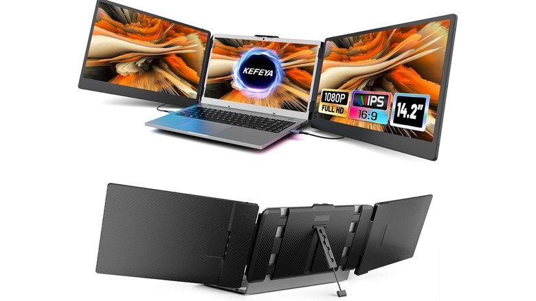 Laptop with two additional screens attached on either side