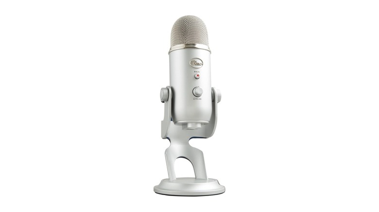 Silver desktop microphone on a stand