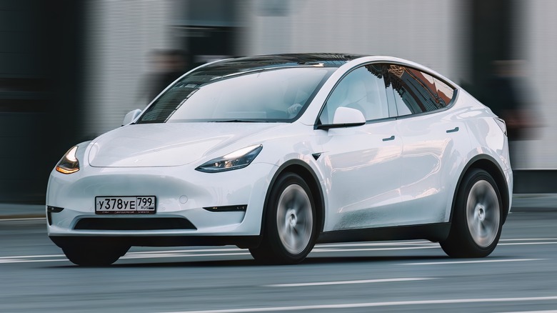 Tesla Model Y driving fast