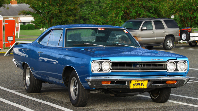 1968 Plymouth GTX parked in parking lot, front-right 3/4 view