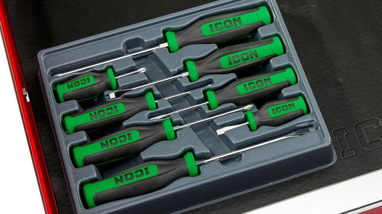 An Icon brand screwdriver set in the top of a toolbox.