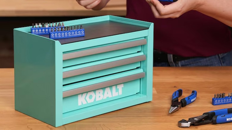 Kobalt Mini Tool Box in teal with Kobalt tools around it