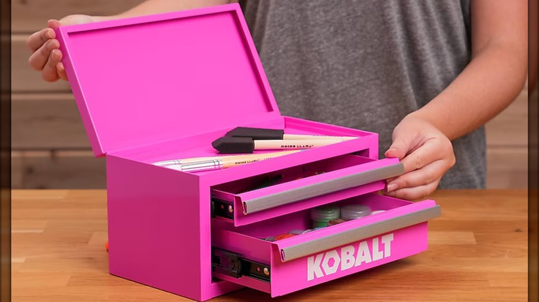 Hot pink Kobalt mini tool box open and in use