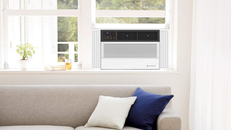 Illustration of a Friedrich AC unit in a window above a couch