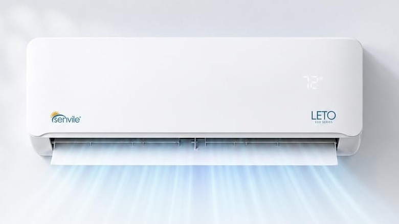 Closeup of a Senville mini split unit on a wall with an illustration alluding to cold air blowing out