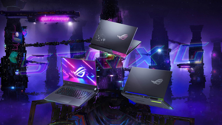 A stylized depiction of three Asus ROG Strix G15 laptops floating on a neon background