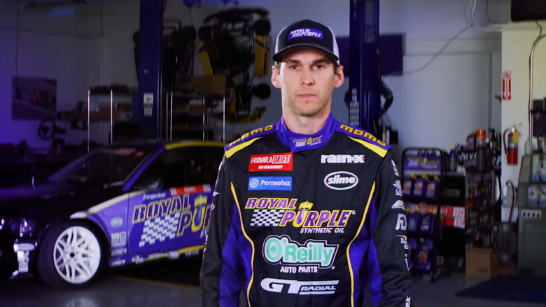 Royal Purple race garage with driver