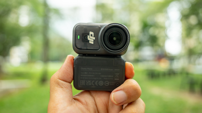 A person holding the DJI Osmo Nano
