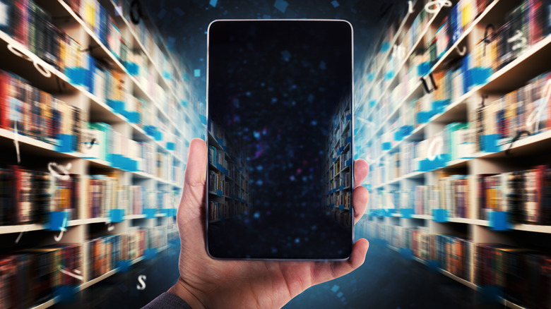 Digitization from paper books to ebooks, tablet with library in background