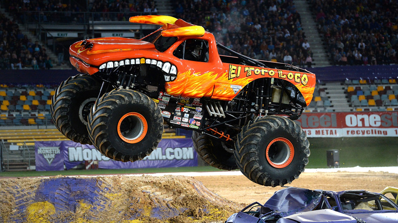 El Toro Loco jumping over a bunch of wrecks