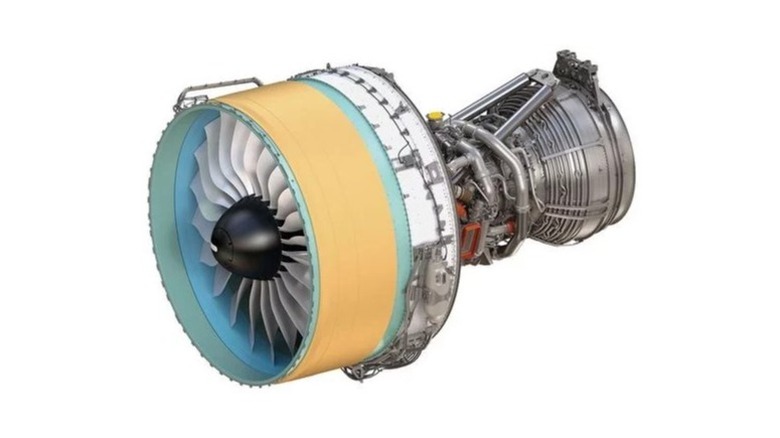 Light orange covering on a plane engine with fan blades and back visible