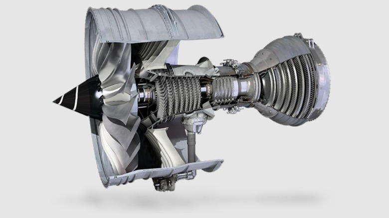 Half-open silver engine design with inner parts visible
