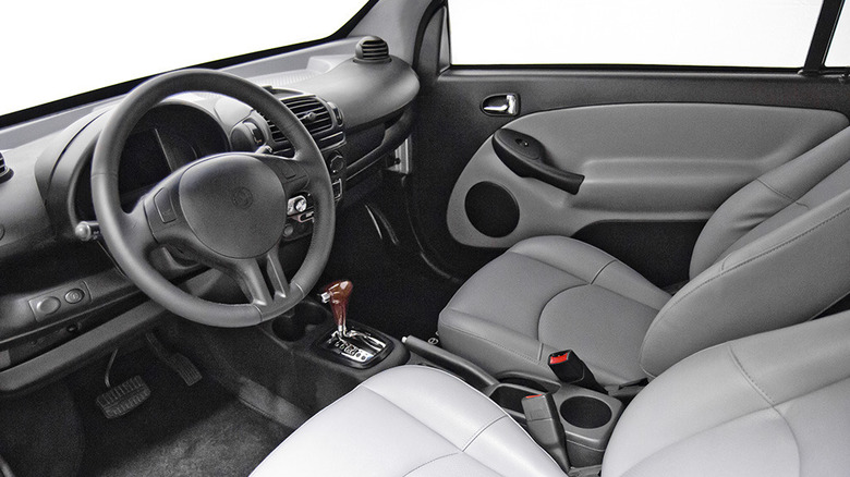 The interior of the Wheego LiFe, driver's side, gray vinyl seats