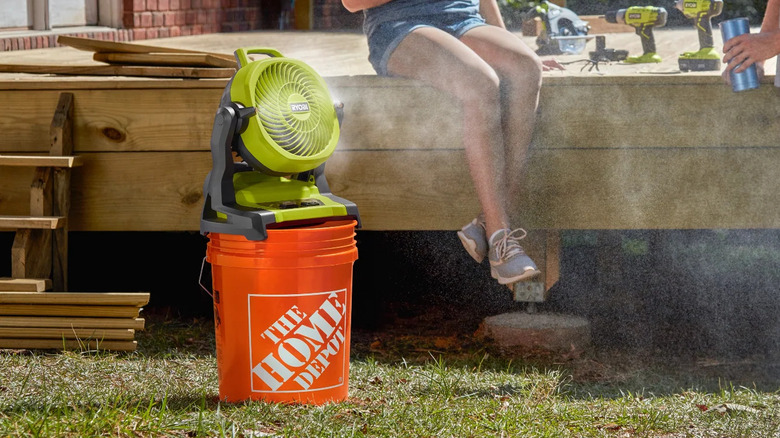 Ryobi misting fan on a Home Depot branded bucket.