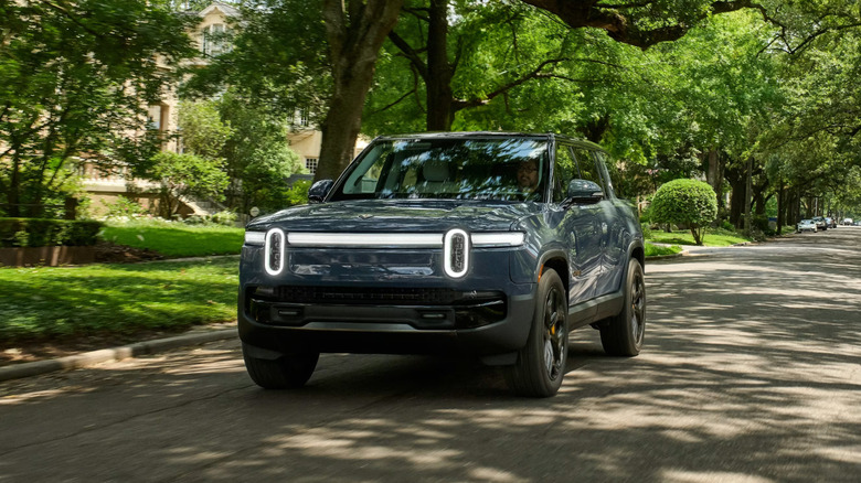 A 2027 Rivian R1S driving