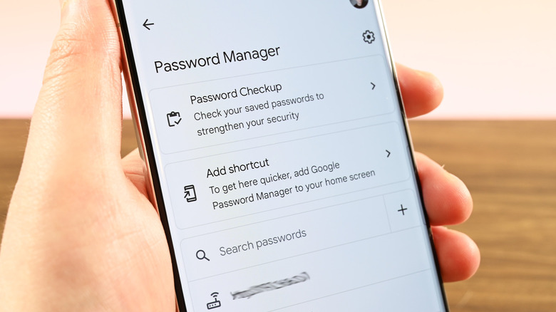 a phone showing Google's Password Manager menu