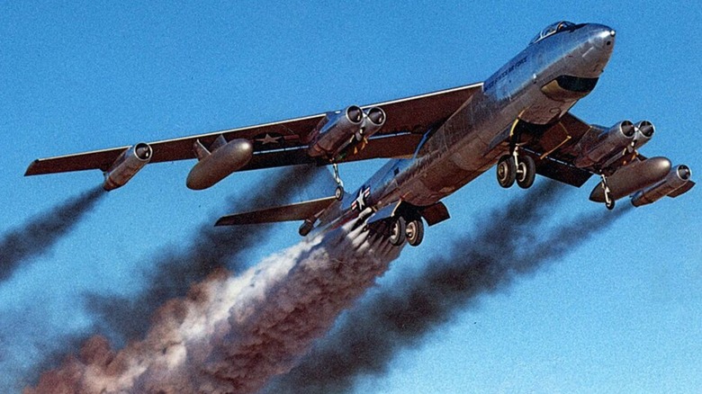 a Boeing B-47 Stratojet taking off while using rockets for assistance