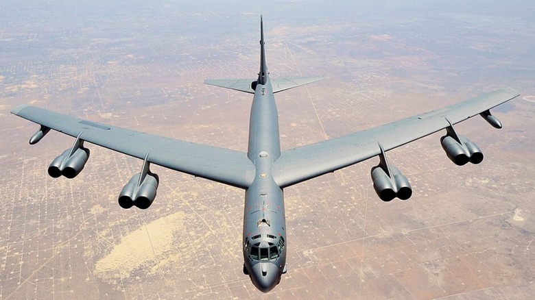 a Boeing B-52 Stratofortress with its eight engines flying over the U.S.