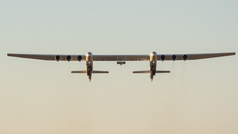 a Stratolaunch Roc taking off showing its six turbofan engines