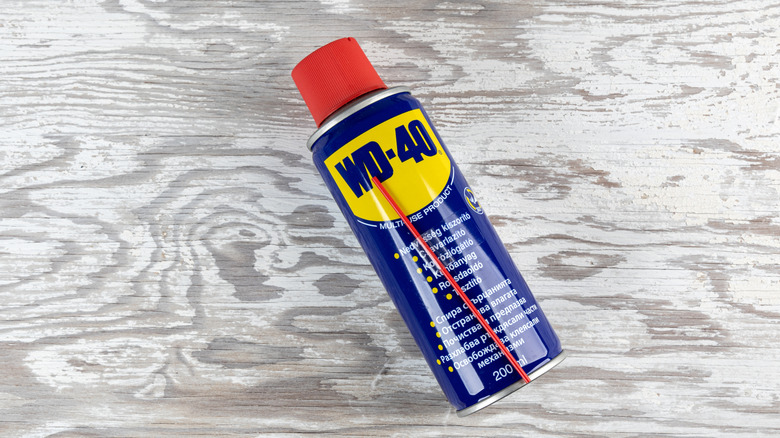 A WD-40 multi-use product on top of a table