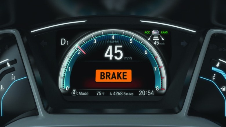 Honda Collision Mitigation Braking System warning on dashboard