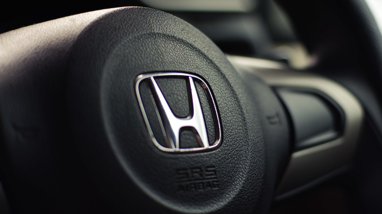 Close-up of a Honda steering wheel with an SRS airbag