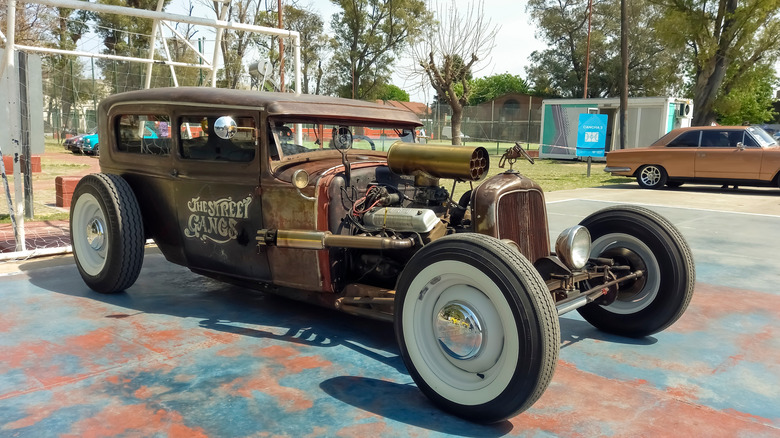 rat rod car on basketball court