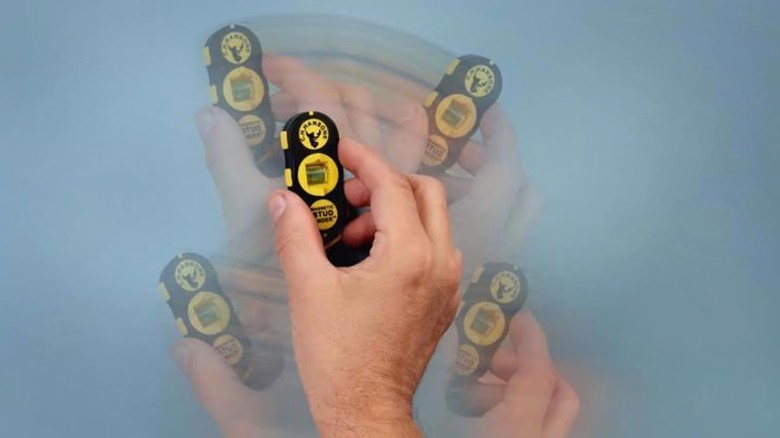 moving stud finder along wall to find stud
