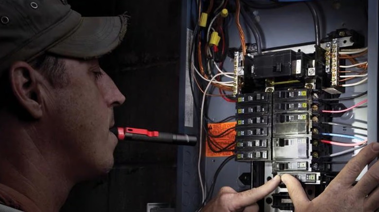 using Milwaukee pen light during electrical installation