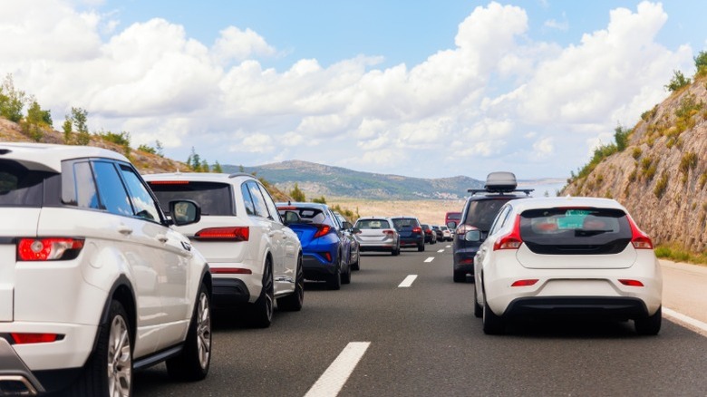 backview of cars stuck in a traffic jam