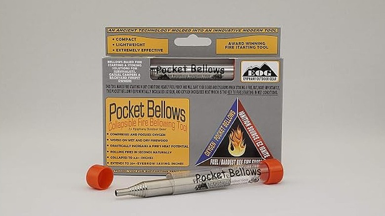 Box of pocket bellows, along with one stick placed in front of it.