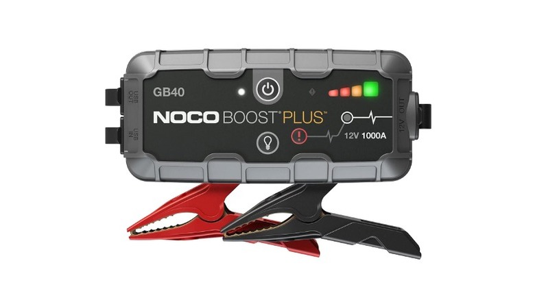 Noco Boost Plus jump starter with red and black plug clips