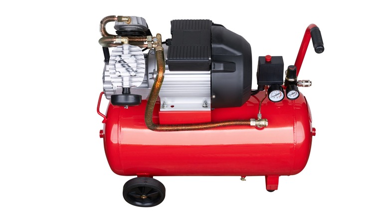 Air compressor on white background
