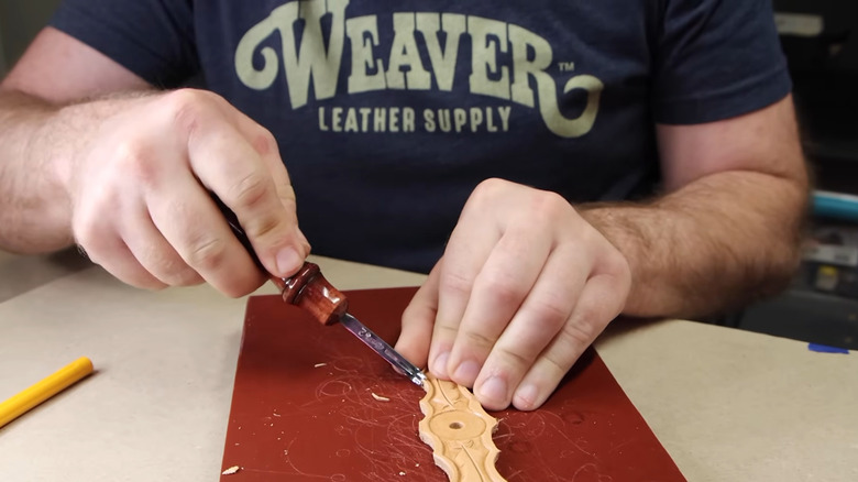 Craftsman using a edge beveler