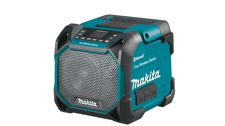Black and turquoise jobsite speaker against a white background.